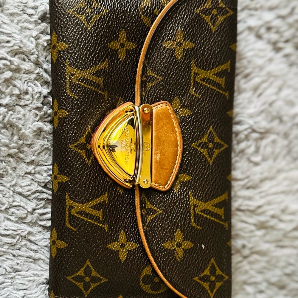 Louis Vuitton Black and Gold Monogram Clutch